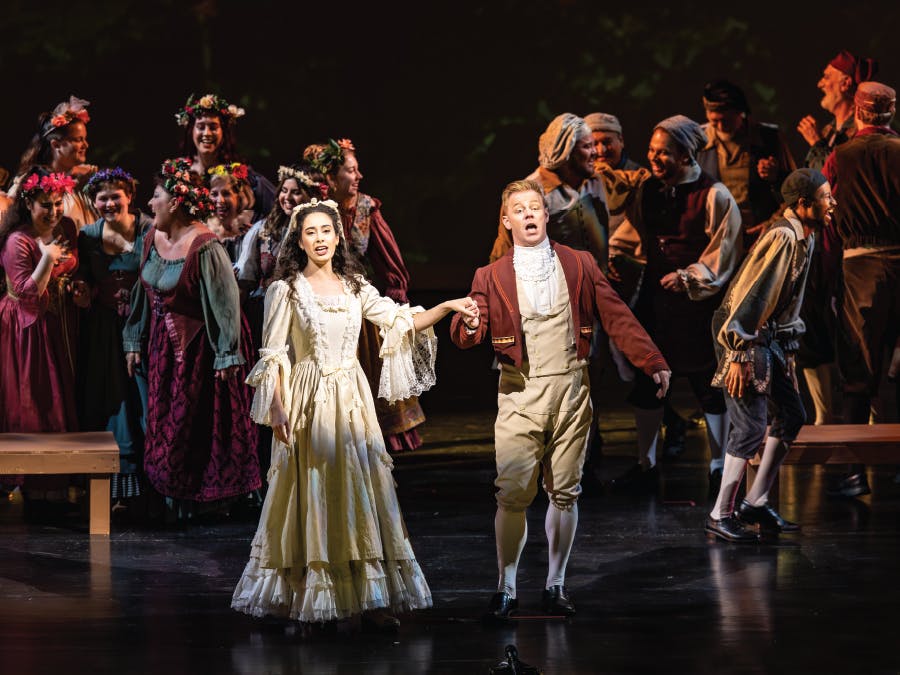 Evelyn Saavedra as Zerlina and Kenneth Stavert as Masetto celebrate their union in Vero Beach Opera’s 2024 production of Don Giovanni (photo by JPR Images).